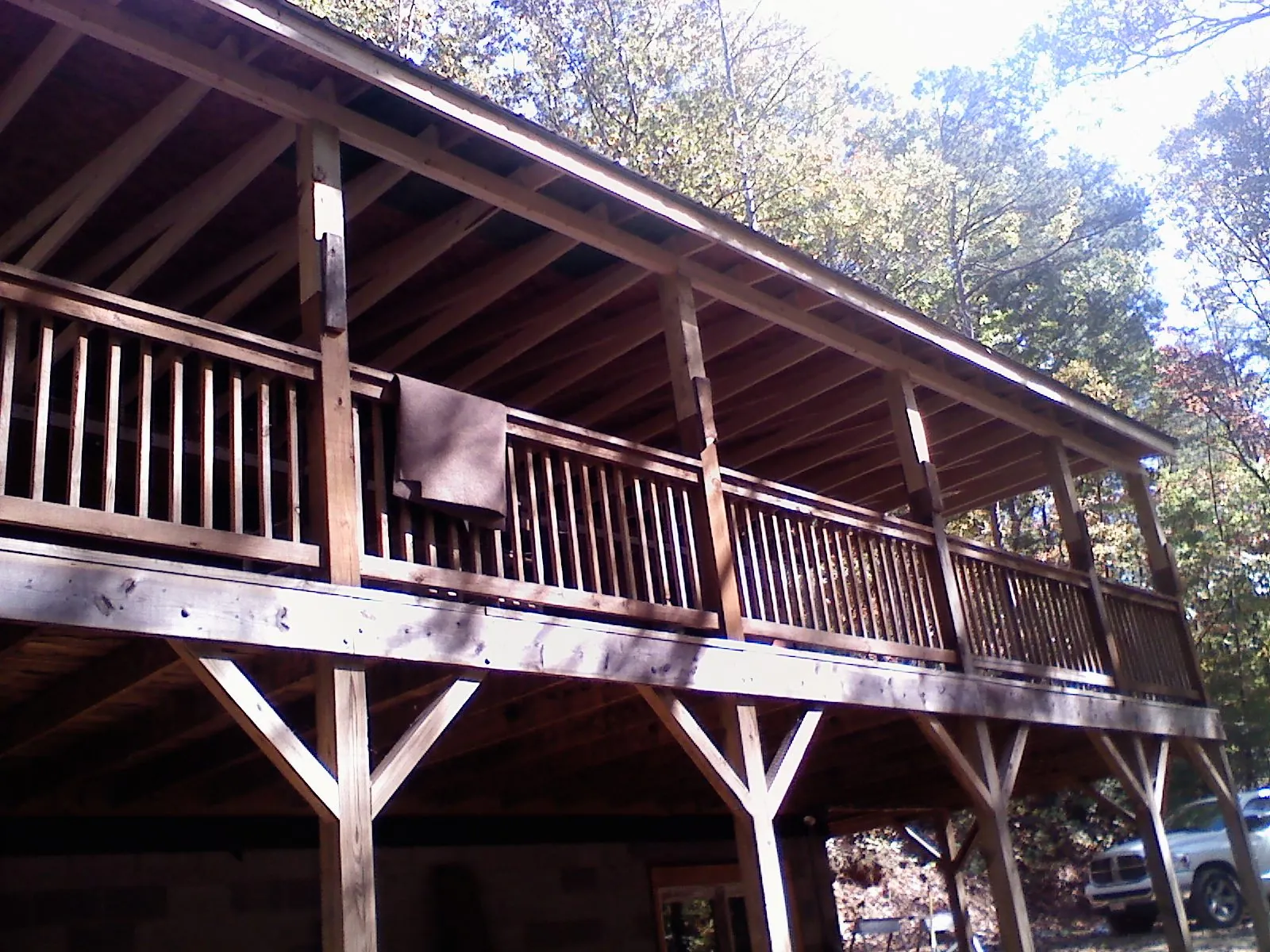 Timber framing under a new elevated porch and deck — Roof Leak Repair in Roswell by Roofing Brothers